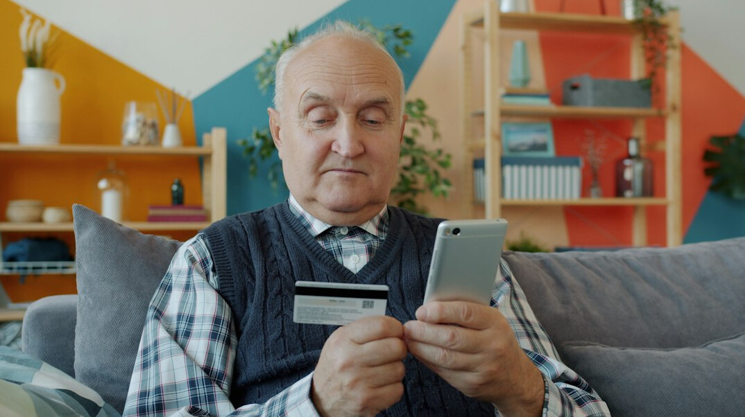 senior using smartphone