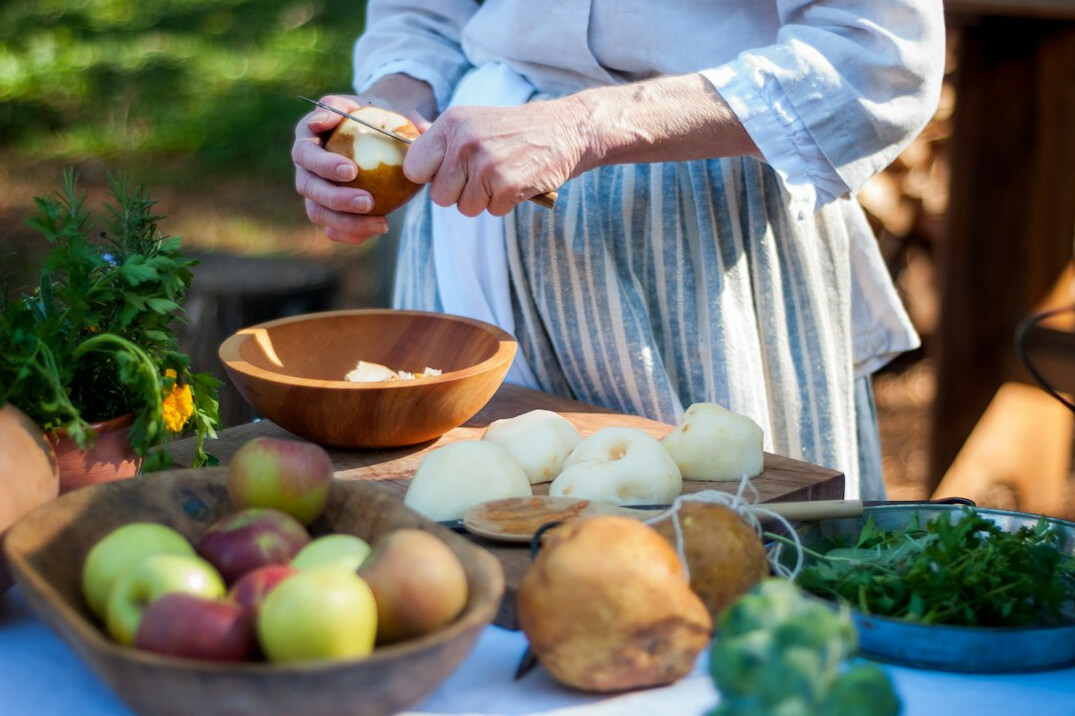 elderly person preparing meal